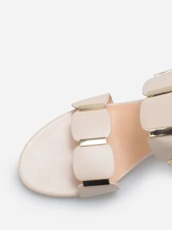 Sale La Modeuse Mules à double brides et détails dorés Beige