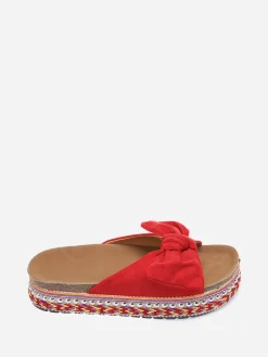 Discount La Modeuse Mules  à noeud et semelle à motifs Rouge