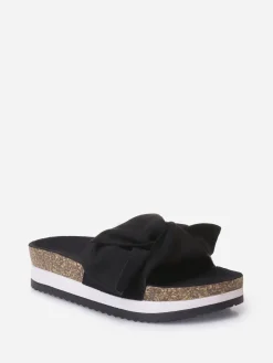 Hot La Modeuse Mules  à semelle creuse et noeud Noir