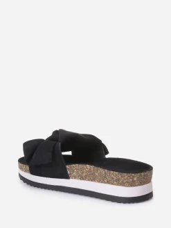 Hot La Modeuse Mules  à semelle creuse et noeud Noir