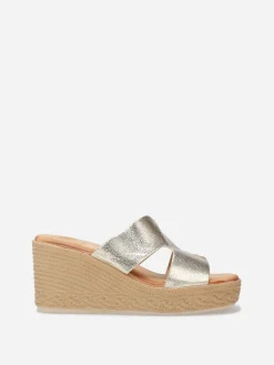 Discount La Modeuse Mules à talon compensé effet tressé Doré