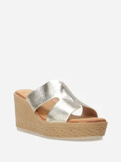 Discount La Modeuse Mules à talon compensé effet tressé Doré