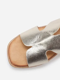 Discount La Modeuse Mules à talon compensé effet tressé Doré