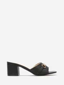 Clearance La Modeuse Mules à talon et détail boucle dorée Noir
