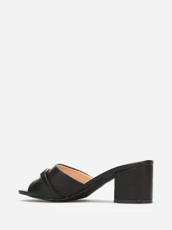 Clearance La Modeuse Mules à talon et détail boucle dorée Noir