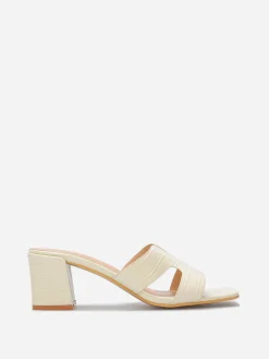 La Modeuse Mules ajourées à talon carré Beige