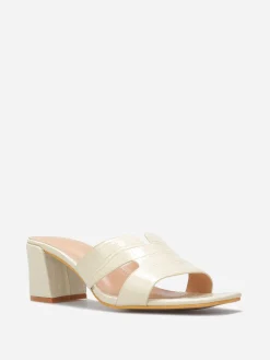 La Modeuse Mules ajourées à talon carré Beige