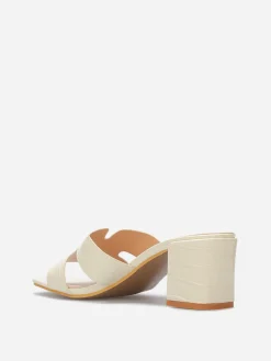La Modeuse Mules ajourées à talon carré Beige