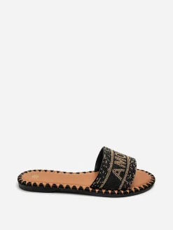 Outlet La Modeuse Mules "Amore" à perles Noir