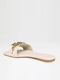 New La Modeuse Mules avec chaîne Beige