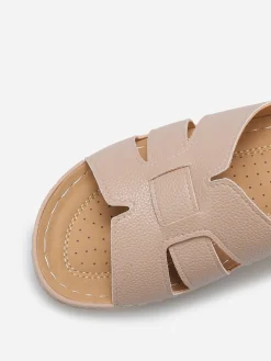 Online La Modeuse Mules compensées à brides croisées Taupe