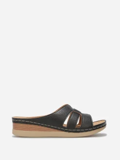 Sale La Modeuse Mules compensées à brides croisées Noir
