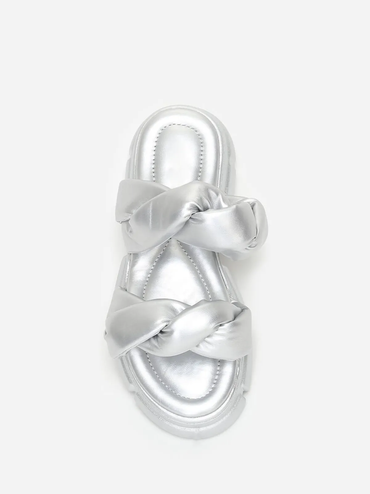 La Modeuse Mules crantées à brides matelassées Argenté