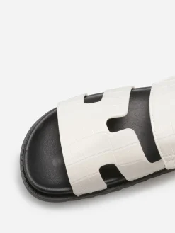 New La Modeuse Mules effet croco à brides ajourées Blanc