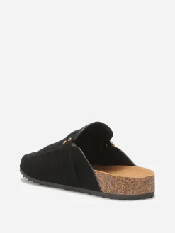 New La Modeuse Mules en suédine à bride et surpiqûres Noir