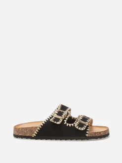 Outlet La Modeuse Mules en suédine à surpiqûres dorées Noir