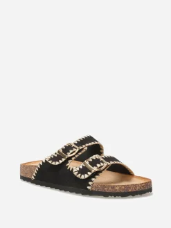 Outlet La Modeuse Mules en suédine à surpiqûres dorées Noir
