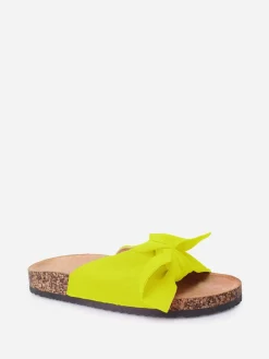 La Modeuse Mules  fluo en tissu et noeud Jaune