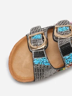 La Modeuse Mules incrustées de strass et perles Noir