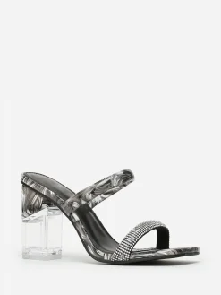 Sale La Modeuse Mules  marbrées à strass et talon transparent Noir