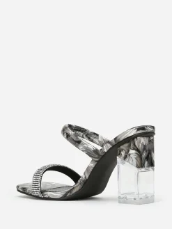 Sale La Modeuse Mules  marbrées à strass et talon transparent Noir