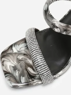 Sale La Modeuse Mules  marbrées à strass et talon transparent Noir