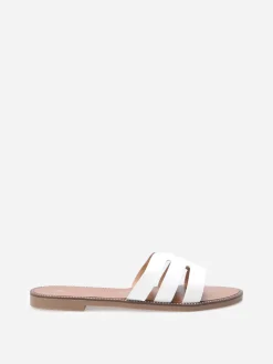 Clearance La Modeuse Mules plates à bride ajourée et clous Blanc