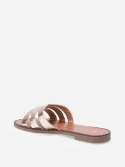 La Modeuse Mules plates à bride ajourée et clous Dorérose