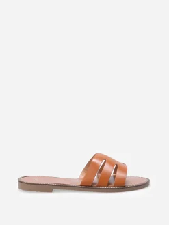 New La Modeuse Mules plates à bride ajourée et clous Camel