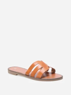 New La Modeuse Mules plates à bride ajourée et clous Camel
