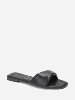 La Modeuse Mules plates à bride torsadée en simili Noir