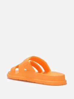 La Modeuse Mules plates à brides ajourées Orange