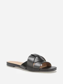 Outlet La Modeuse Mules plates à brides entrecroisées Noir
