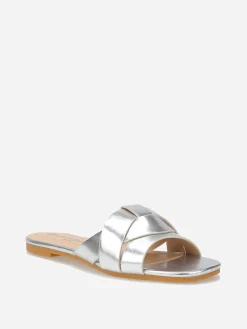 Discount La Modeuse Mules plates à brides entrecroisées Argenté
