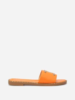 Discount La Modeuse Mules plates à détails dorés Orange