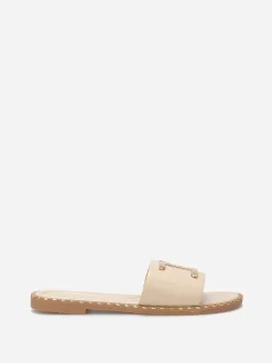 Discount La Modeuse Mules plates à détails dorés Beige