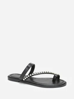La Modeuse Mules plates à fines brides et perles Noir