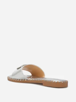 New La Modeuse Mules plates à strass et clous Argenté