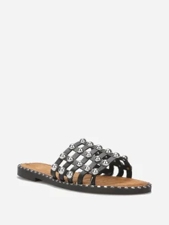 La Modeuse Mules quadrillées à clous Noir