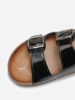 Online La Modeuse Mules vernies à boucles Noir
