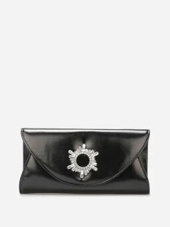 Sale La Modeuse Pochette de soirée à boucle en strass Noir