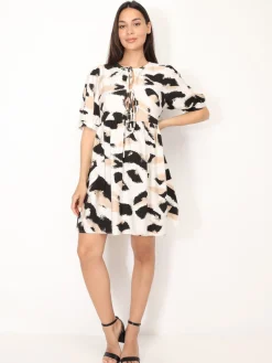 La Modeuse Robe à motif tacheté et N艙uds Beige