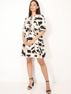 La Modeuse Robe à motif tacheté et N艙uds Beige