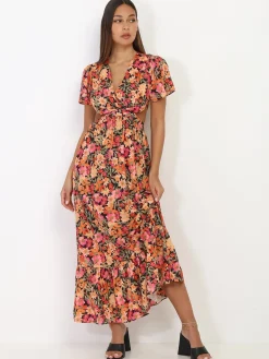 New La Modeuse Robe longue à fleurs avec découpes Noir