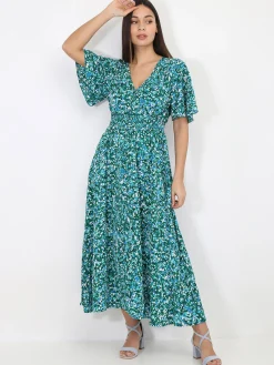 Hot La Modeuse Robe longue à motif tacheté Vert