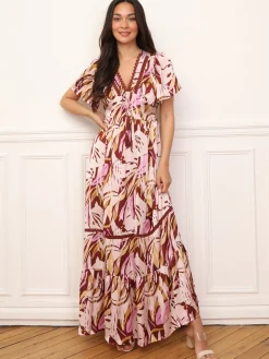 New La Modeuse Robe longue à motif tropical et pompons Rose
