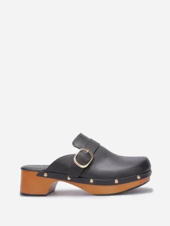 Sale La Modeuse Sabots cloutés en simili Noir