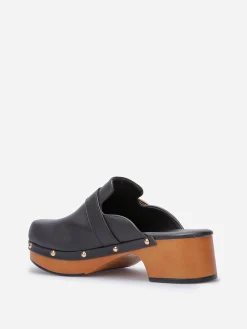 Sale La Modeuse Sabots cloutés en simili Noir