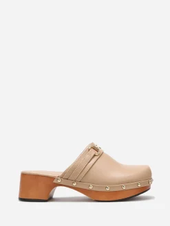 La Modeuse Sabots en simili à clous dorés Taupe