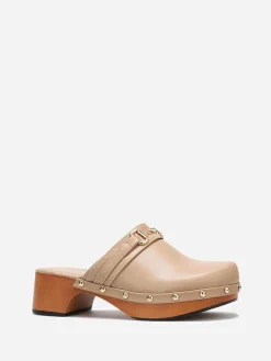 La Modeuse Sabots en simili à clous dorés Taupe